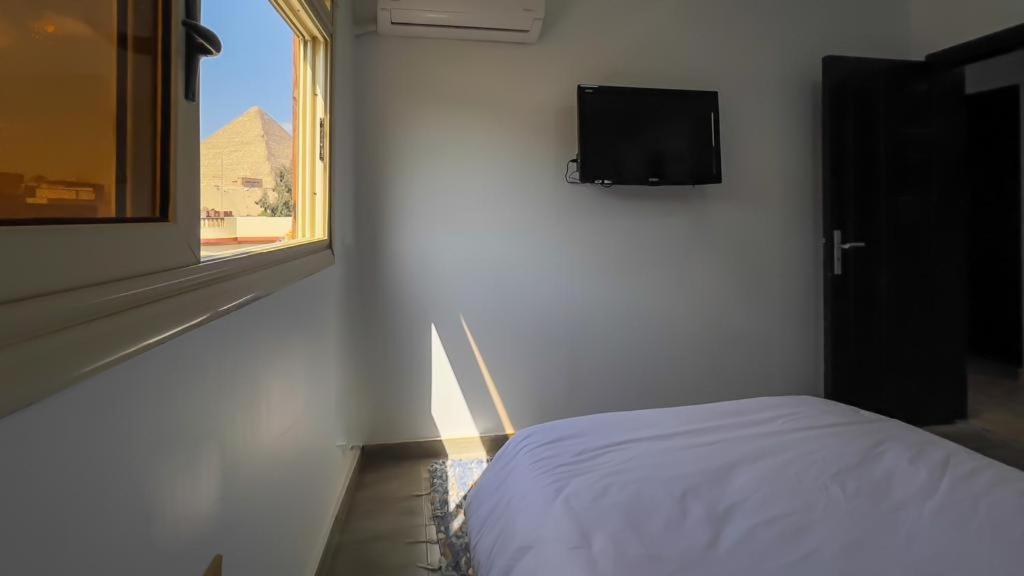 Pyramids View, Apartment Kairo Bagian luar foto