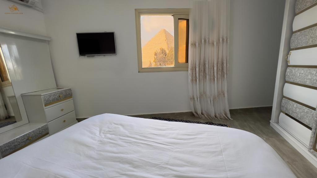 Pyramids View, Apartment Kairo Bagian luar foto